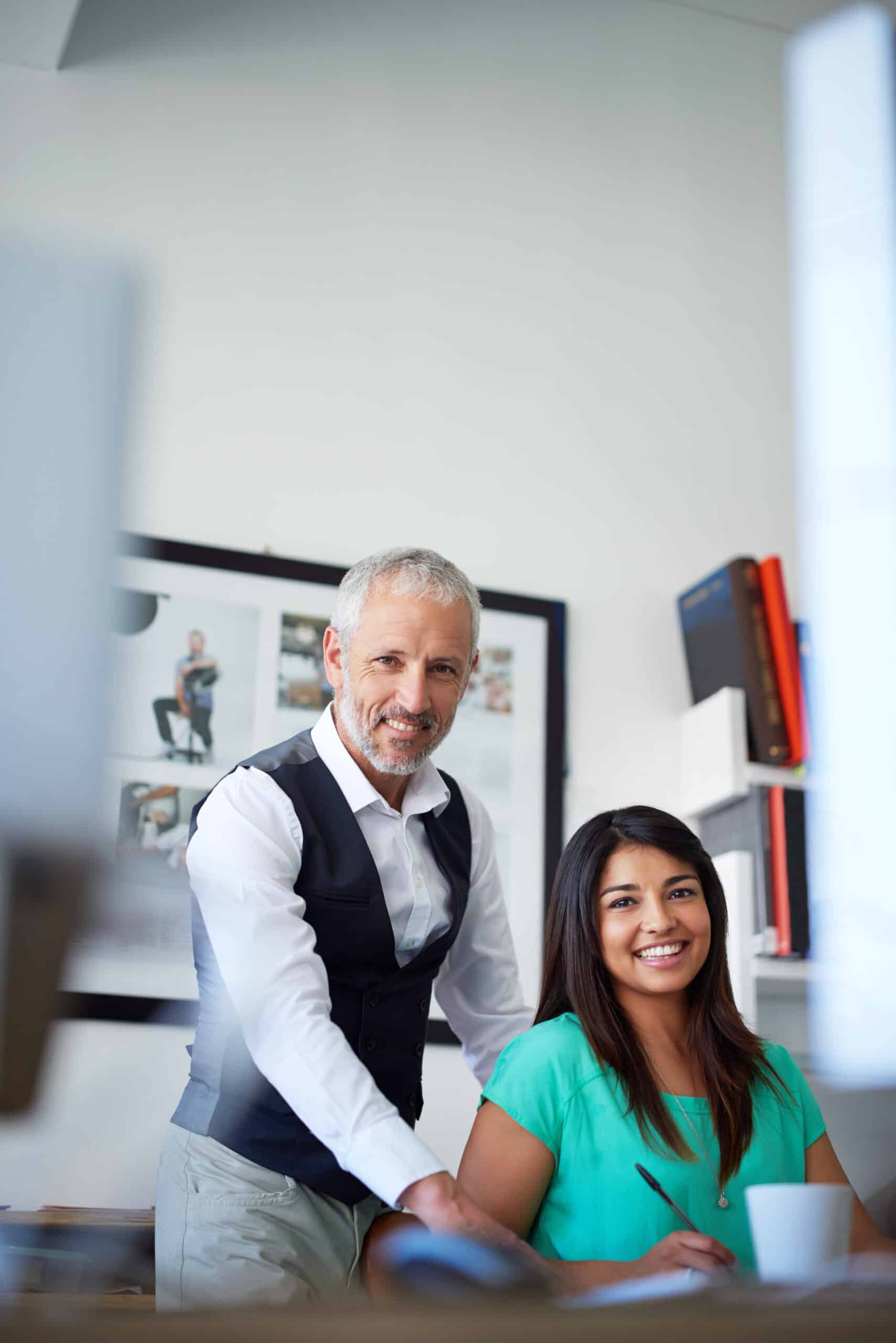 We believe in producing quality work. Cropped portrait of two designers in their office